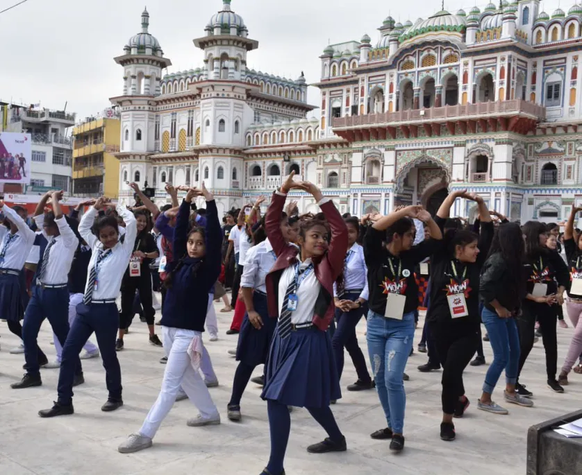 Children dancing in a square in Janakpur